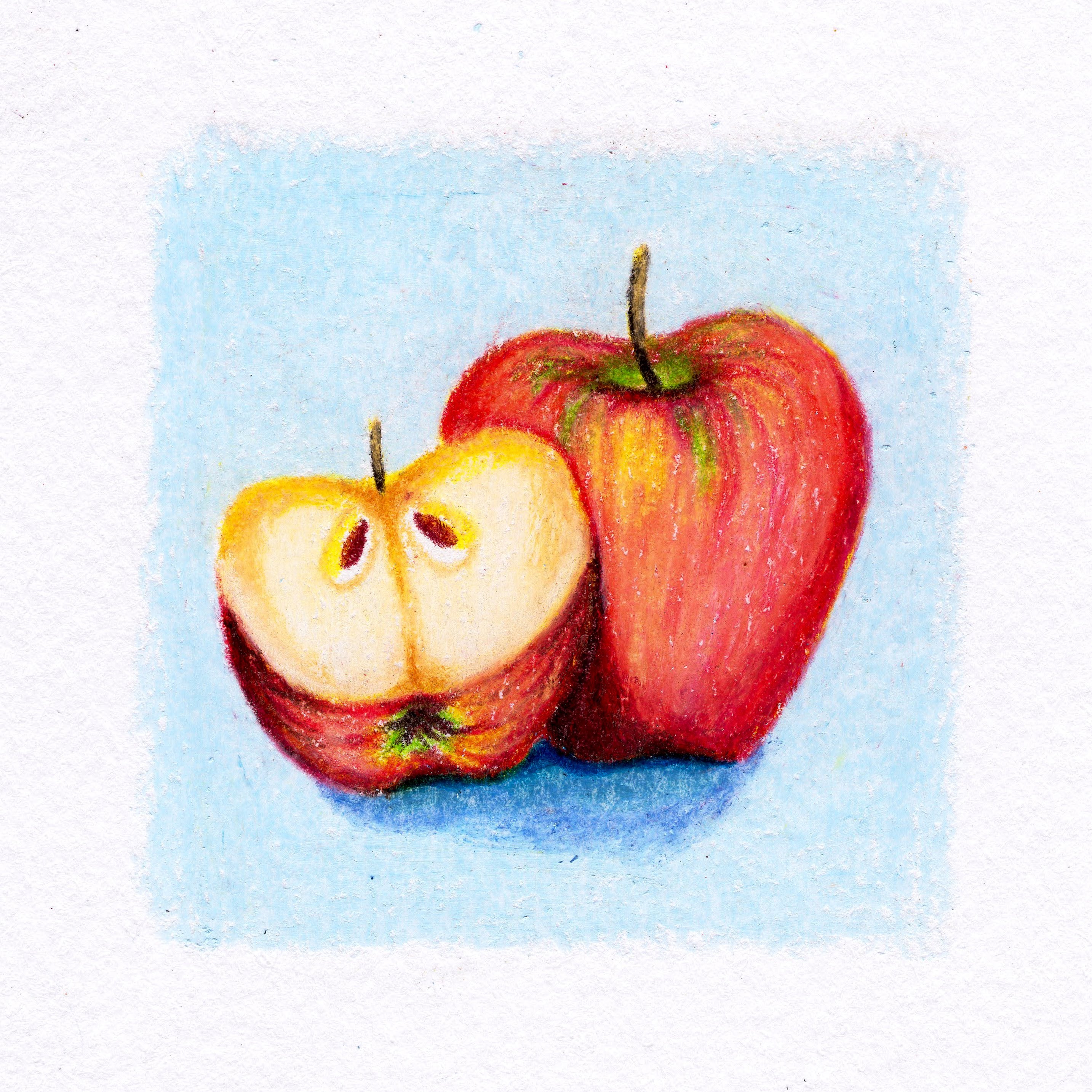 One whole apple and one half-cut abble on a pale blue background. 262/365 of the 000/365 collection by charming cavatica