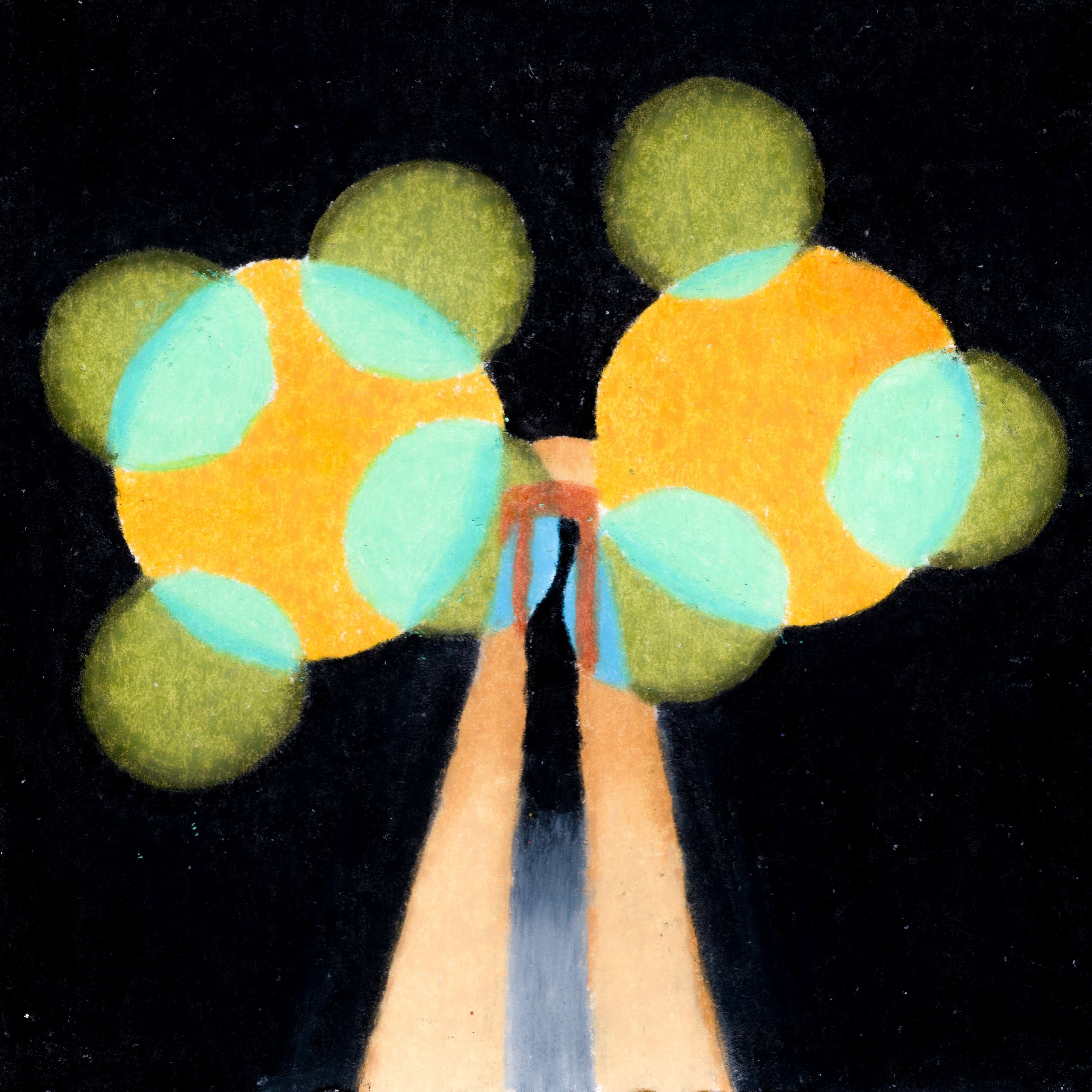 Two yellow orbs with smaller green orbs jutting outward. The orbs are rested on either side of a two-legged light beige stand. A black background. 318/365 of the 000/365 collection by charming cavatica