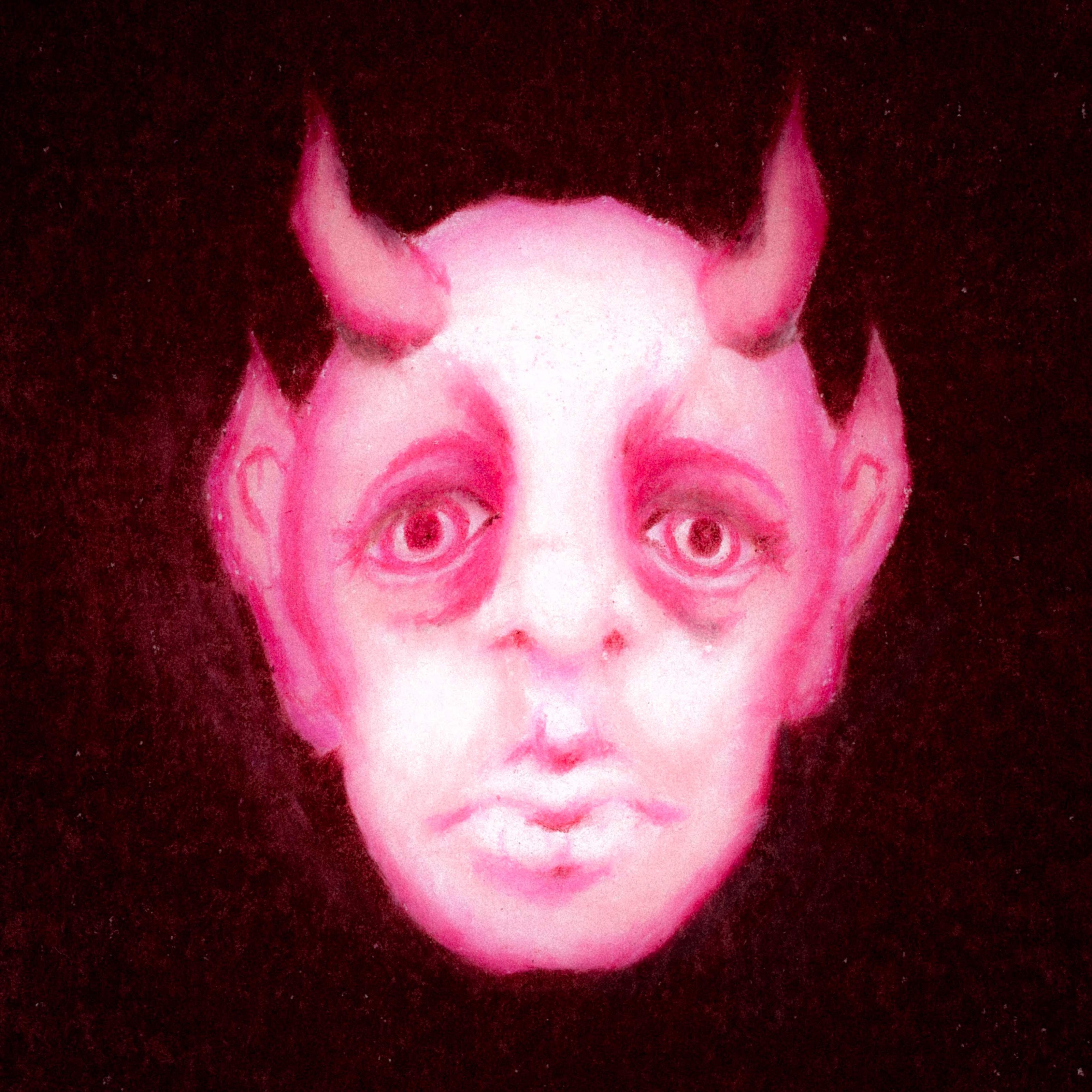 A close up of a red face with devil horns. 331/365 of the 000/365 collection by charming cavatica